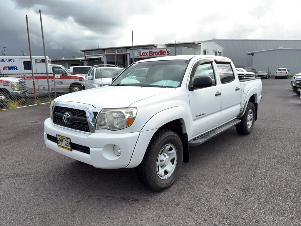 2011 Toyota Tacoma PreRunner in Super White — front three-quarter view