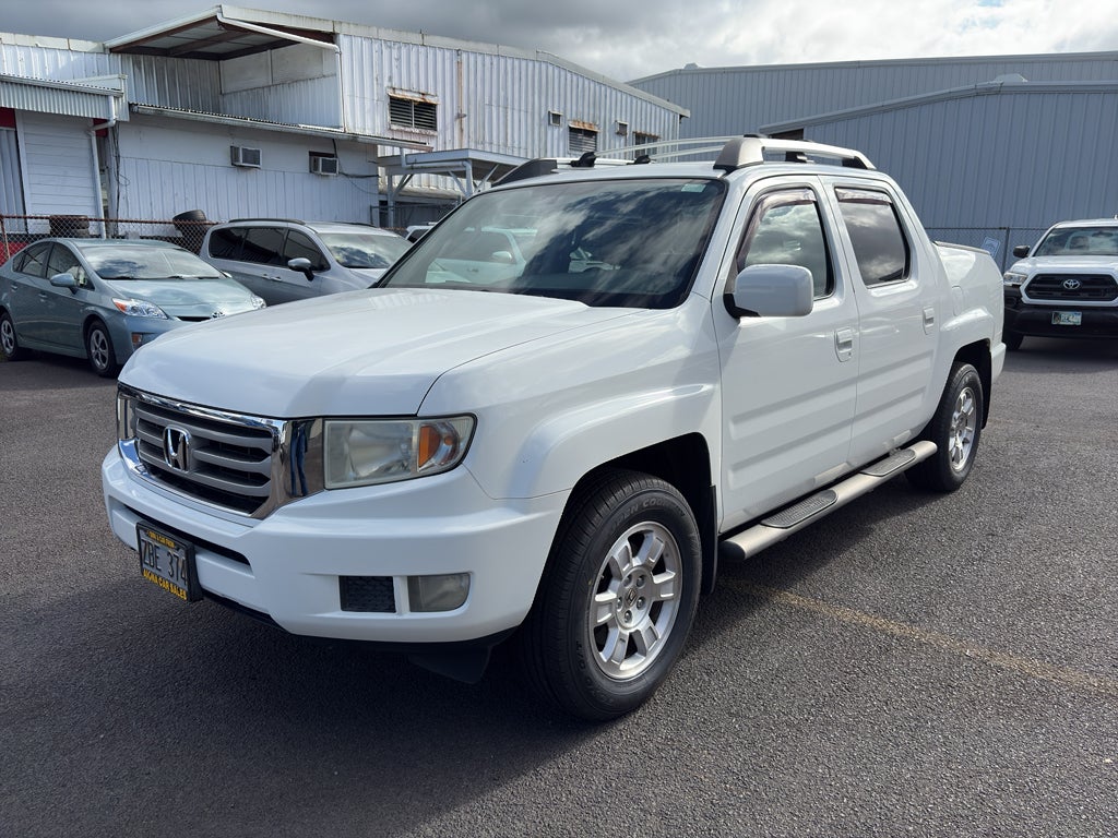 2013 Honda Ridgeline RTS in White — front three-quarter view