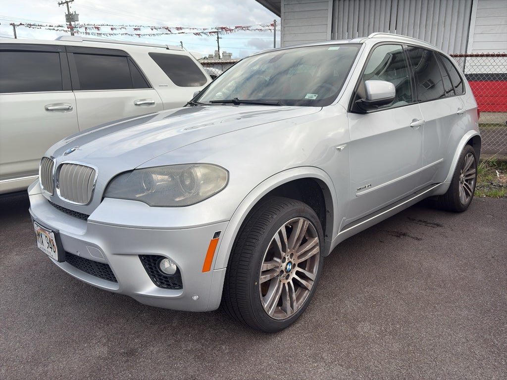 2012 BMW X5 50i in Titanium Silver Metallic — front three-quarter view